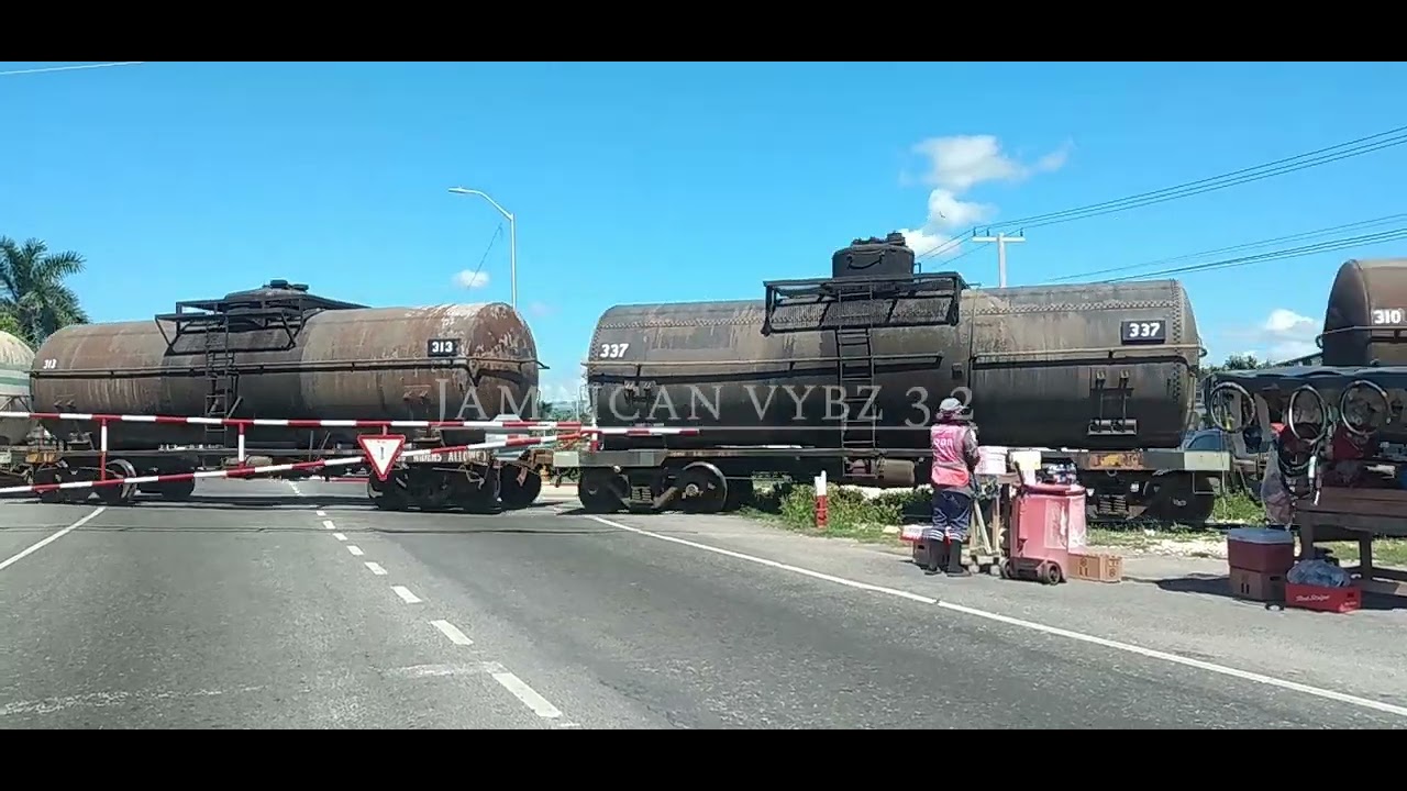 Train Passing through Spanish Town.
