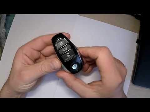 Замена батарейки в ключе TOUAREG NF.Replacing the battery in the key Touareg NF