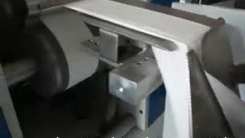 Automatic embossing serviette tissue L folding napkin paper machine