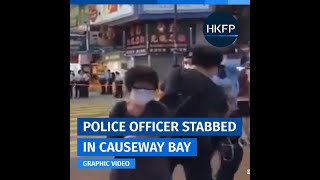 [Graphic video] Hong Kong police officer stabbed by assailant in Causeway Bay