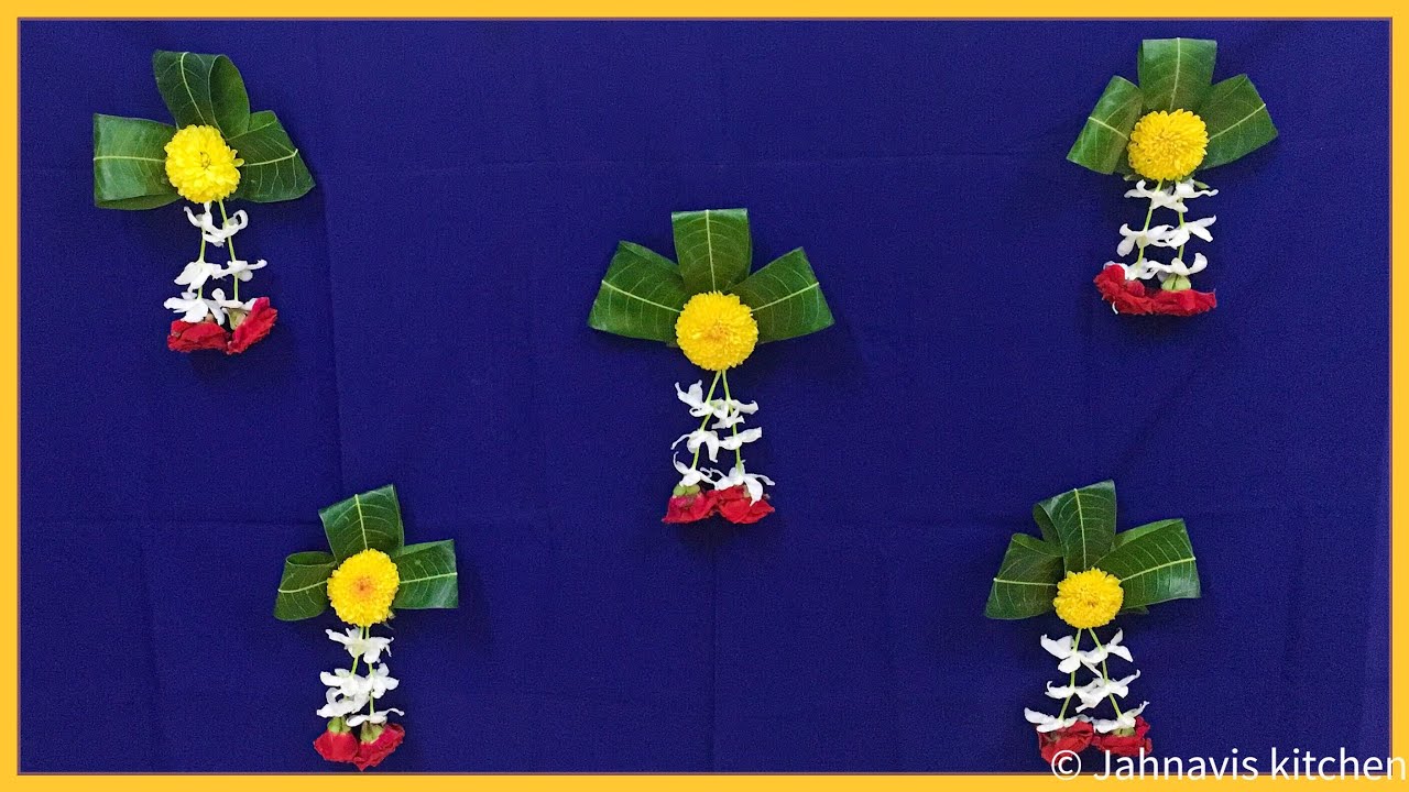 Background decoration for Ganesh Chaturthi | Ganesh chaturthi decoration with mango leaves & flowers Background decoration for Ganesh Chaturthi | Ganesh chaturthi decoration with mango leaves & flowers