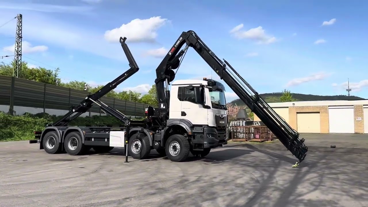 MAN TGS 35.520 BB 8x4 HD Truck Solutions Abrollkipper Multilift 25 S 56 Kran Hiab 228-6
