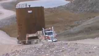 Steel Tanks 34'D 40'H 80,000 Lbs. climbing steep 18% grade on Baffin Island in Arctic Circle