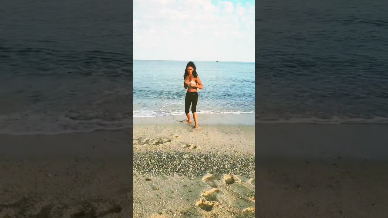 Shadow boxing on the beach. 