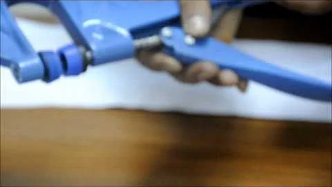 H-1 Hand Plier with #2 Self Piercing Banner Eyelet.wmv