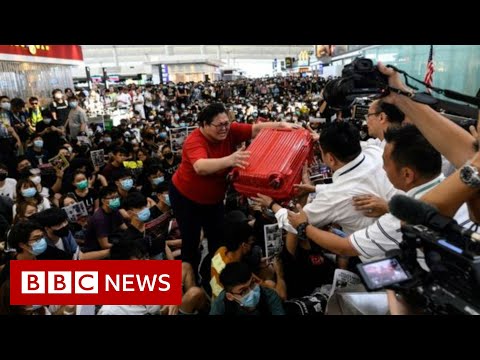 Hong Kong protests disrupt airport for second day – BBC News