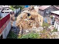 Best action  bulldozer pushing and clearing trash filling the land with mini dump truck