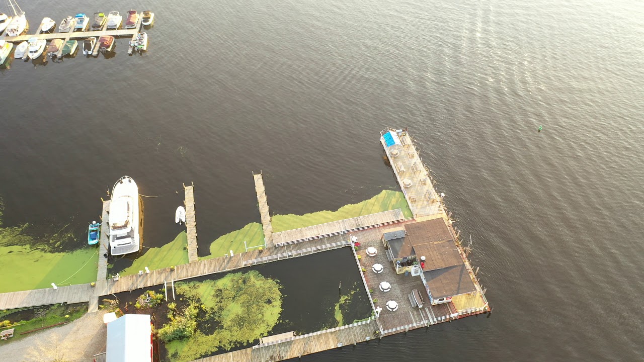 Red Dock at Kalamazoo Lake, Kalamzoo River Douglas Michigan Drone video tour