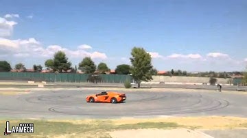 Cristiano Ronaldo on the track with Jenson Button