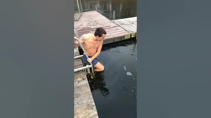 Guy Bumps Head on Ice During Frozen Lake Swim || ViralHog