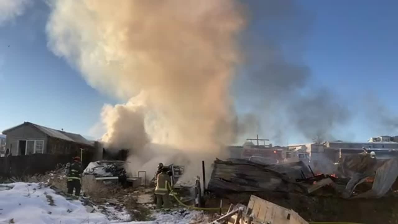 Firefighters mop up after fire destroys Billings home - YouTube