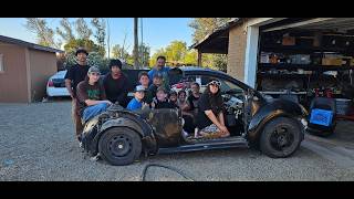 Kids install the TDI motor in our BUG