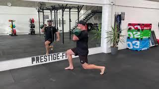 Kettlebell Single Arm Front Rack Forward Lunge demonstration