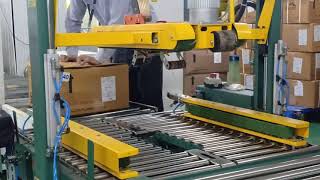 6 RM SIGNODE MAKE AUTOMATIC RANDOM CARTON TAPING MACHINE AND AUTOMATIC STRAPPING MACHINE