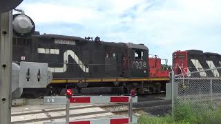 CN L568 LHF GP9s 7038 and 4130 Switching Kitchener yard and departing