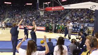 Cosmo the Cougar gets launched from the three-point line