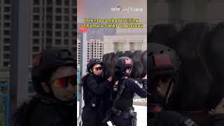 Intense combat training of Female SWAT on plateau