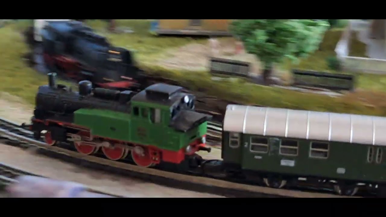 My almost 89 y.o. dad running his Märklin Z-scale model trains