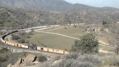 Union Pacific manifest train at Tehachapi Loop with MoPac Heritage Unit #1982 3-27-13