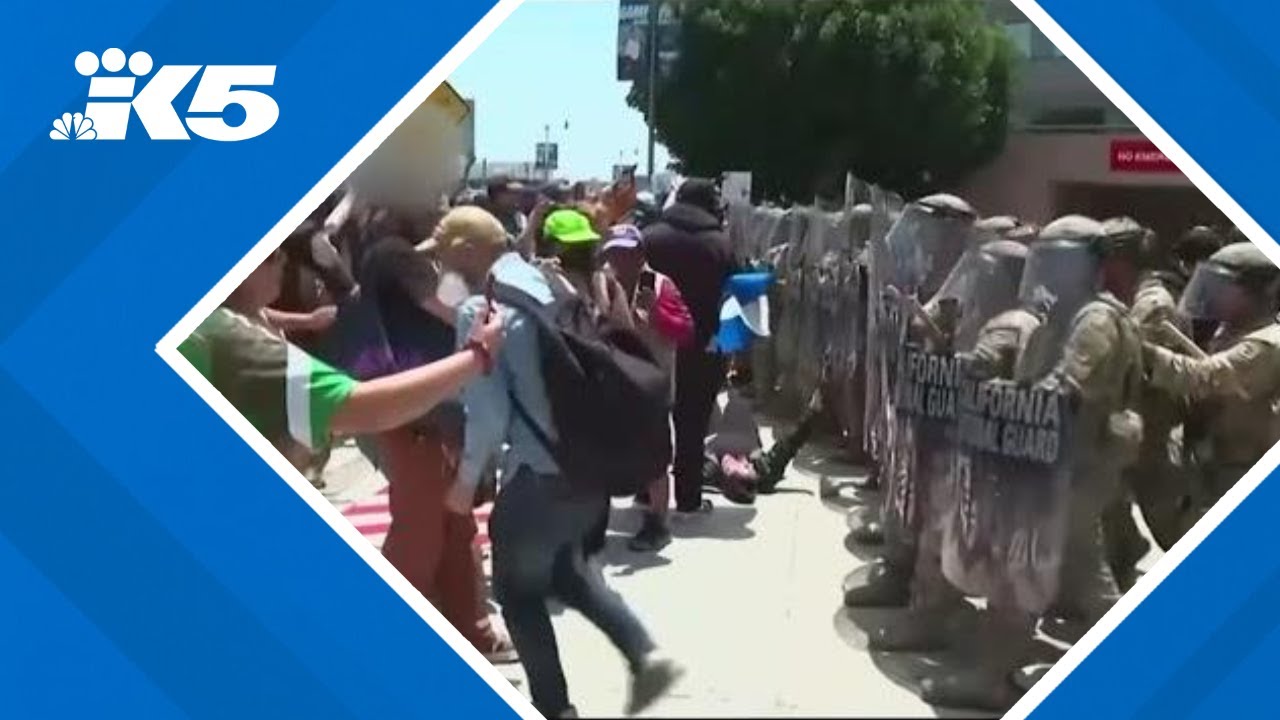 LAPD officers and National Guardsmen clash with protesters