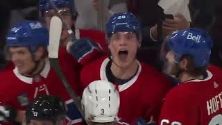 Juraj Slafkovsky taunts a Coyotes player after scoring his first NHL goal