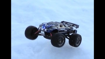 Traxxas 1/16 E Revo Snow Bash Video