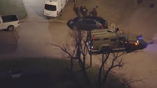 Sky 5 video shows several law enforcement officers, armored vehicle in Del City neighborhood