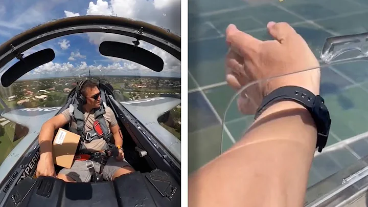 Man Sticks His Hand Out Of Aircraft