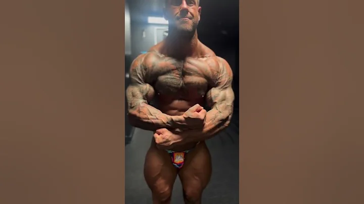 Matt McCullough flexing