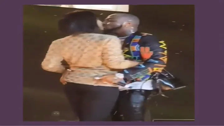 SNOW TV  :  DAVIDO GIVES CHIOMA A WARM KISS ON THE STAGE  PERFORMING AT 02 ARENA SOLD OUT SHOW