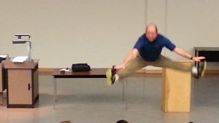 Chemistry instructor does a cartwheel & splits