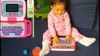 Baby's reaction to her new laptop toy LeapFrog 2 in 1 LeapTop Touch