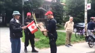 Lone anti-separatist protester outside Parizeau funeral, June 9, 2015