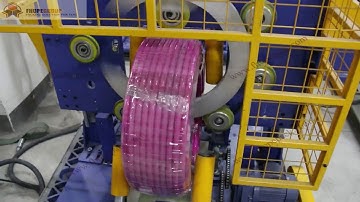 Hose coil wrapping machine