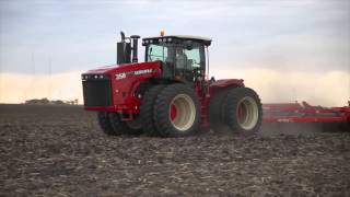 Versatile 4WD model 350 pulling a 60 Rite Way roller