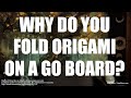 Why do you fold origami on a go board