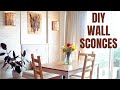 Easy dining room makeover reusing existing furniture and new DIY wall sconces
