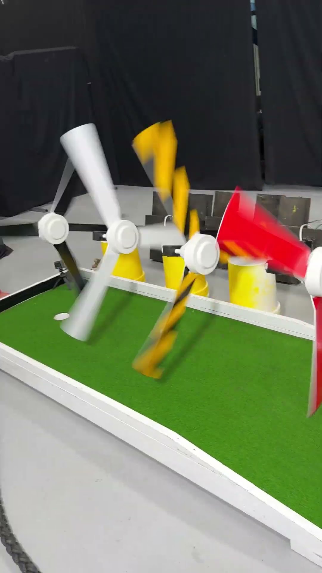 Mini Golf Through 10 Spinning Fans!!
