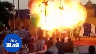 Moment nitrogen balloons explode in a massive ball of flames - Daily Mail