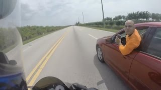 Car Tries to KILL Motorcyclist - Road Rage!