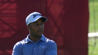 Harold Varner III finishes in style on No. 18 at Quicken Loans