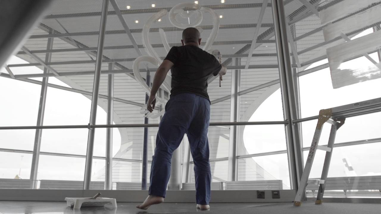 Chinese artist Pan Jianfeng creates art at Helsinki Airport