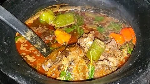 Guinea fowl light soup. Ghanaian Akonfem soup in a Clay pot