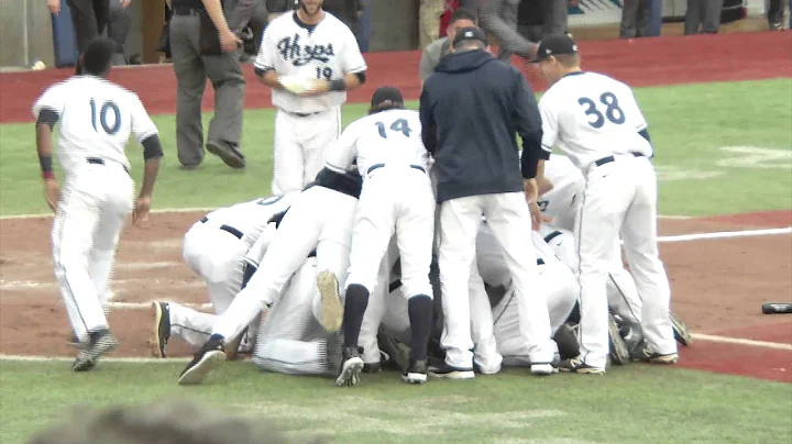 Alexis Olmeda slides home to score the winning run