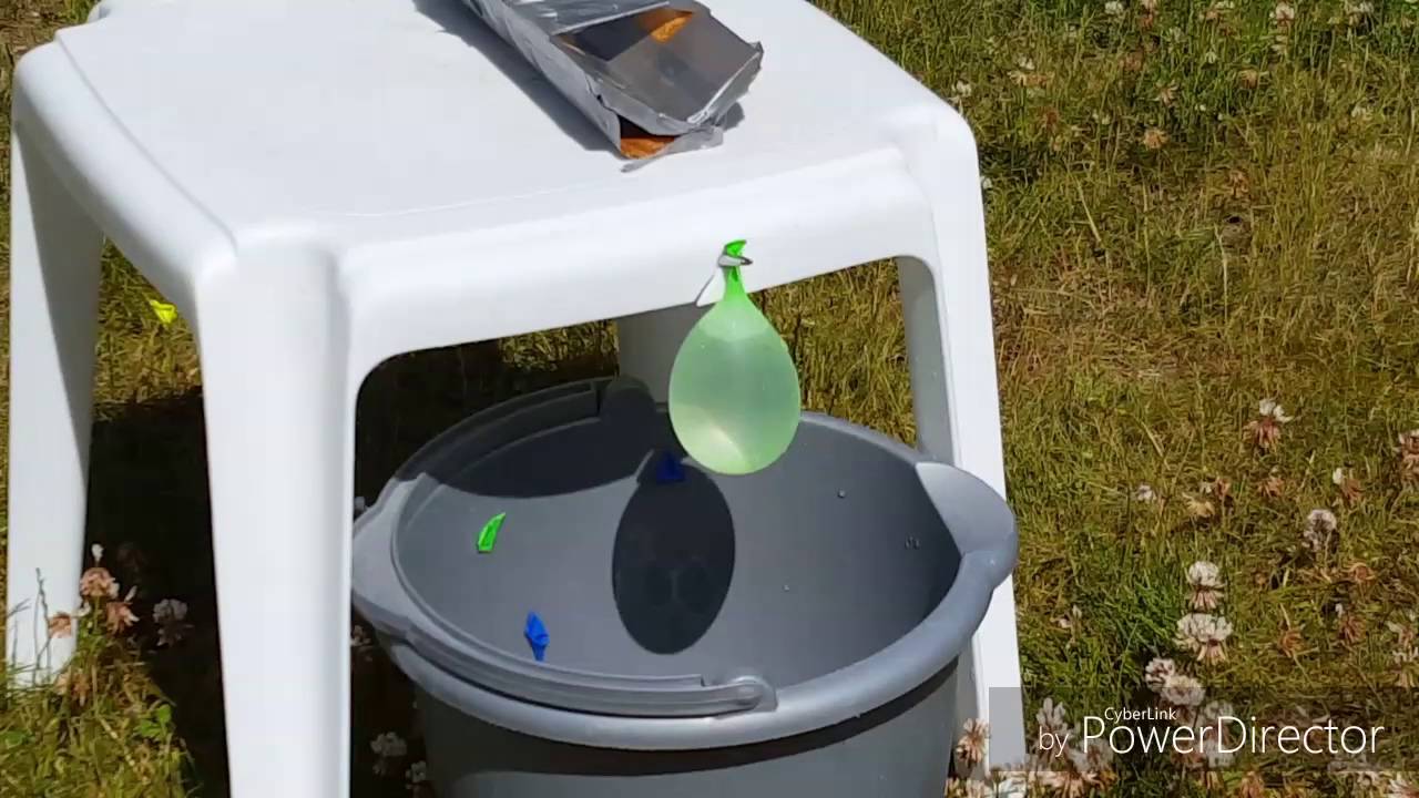 Popping balloon filled with water YouTube