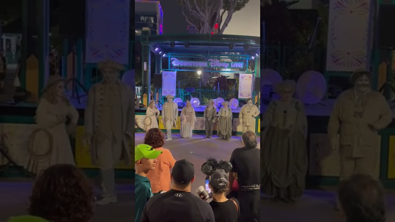 Grim Grinning Ghosts from the Haunted Mansion singing in Downtown Disneyland