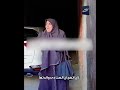 A Woman Wearing A Niqab Is Groping An Elderly Woman In The Street 