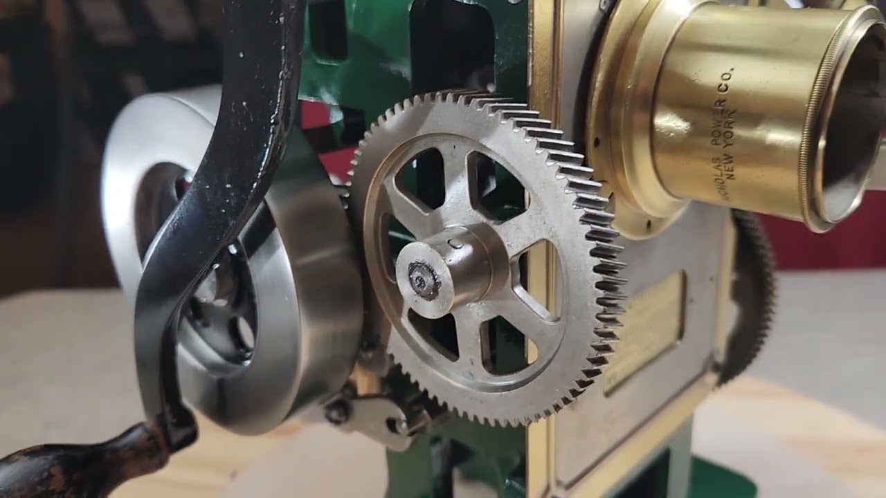 Analog Dan vs the Vintage 35MM cameragraph hand crank projector. All done!