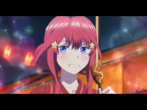 Itsuki Nakano eats a CornDog