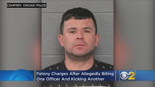 Man Charged With Biting, Kicking Chicago Police Officers; Threatening Roommates With Knife